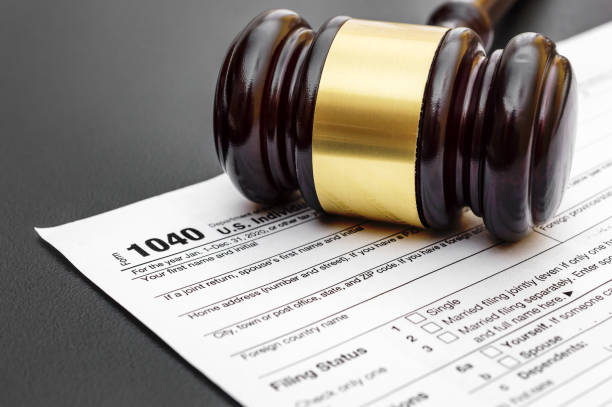 Former IRS Agent Sentenced to 18 Months in Prison