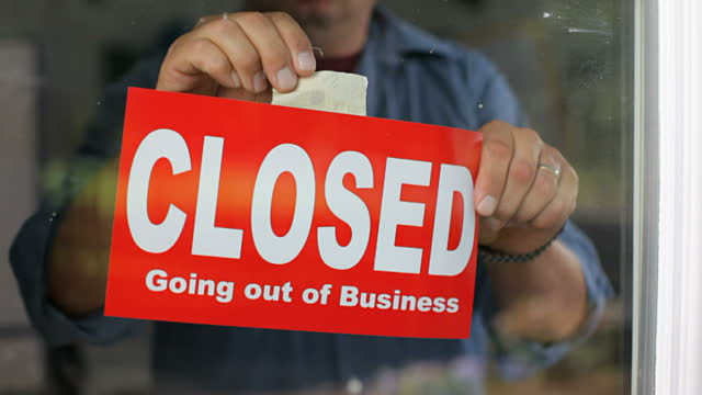going out of business closed sign on window 1  591cd078a2106